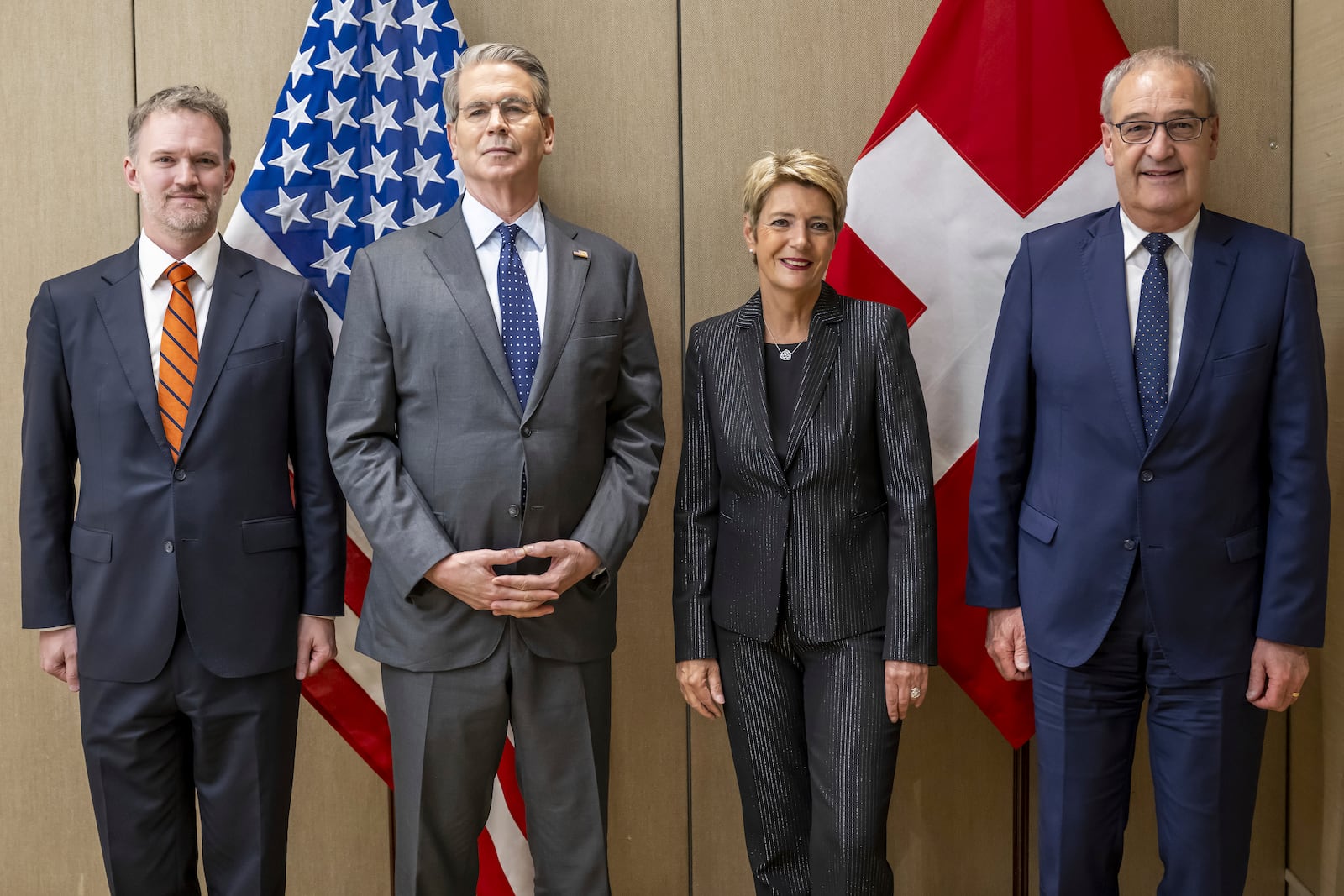 US Trade Representative Jamieson Greer, US Secretary of the Treasury Scott Bessent, Switzerland's President Karin Keller-Sutter, Switzerland's Economy Minister Federal Councillor Guy Parmelin, left and right pose, during a bilateral meeting between Switzerland and the United States, in Geneva, Switzerland, on Friday, May 9, 2025. (Martial Trezzini/Keystone via AP)