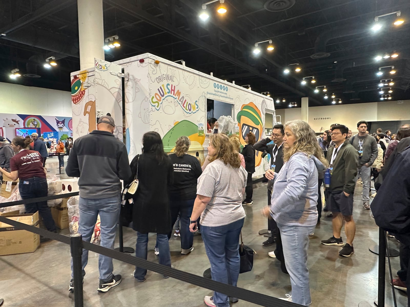 Berkshire Hathaway shareholders line up Friday, May 2, 2025 for the chance to buy Warren Buffett and Charlie Munger Squishmallows in Omaha, Neb. (AP Photo/Josh Funk)