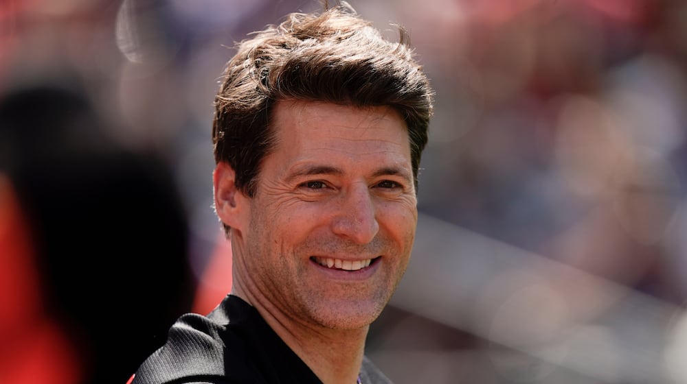 FILE - Tony Dokoupil, co-host of "CBS This Morning", looks on before throwing a ceremonial first pitch prior to a baseball game between the Baltimore Orioles and the Texas Rangers, May 27, 2023, in Baltimore. (AP Photo/Julio Cortez, File)