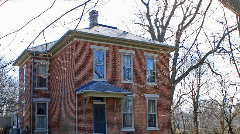 Built in 1910, this home sits on nearly 6 acres and has a carriage-style garage that includes a second-level suite. The main home has about 2,750 sq. ft. of living space and 3 bedrooms. CONTRIBUTED PHOTO BY VICKIE KAPNAS
