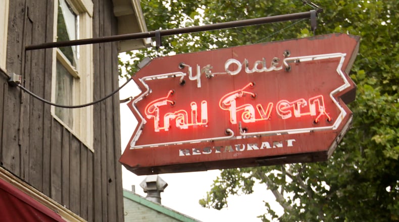 A log cabin built in 1827, Ye Olde Trail Tavern on Xenia Avenue is the oldest building in Yellow Springs and is believed to be the second oldest existing tavern in Ohio. Staff photo by Jim Witmer