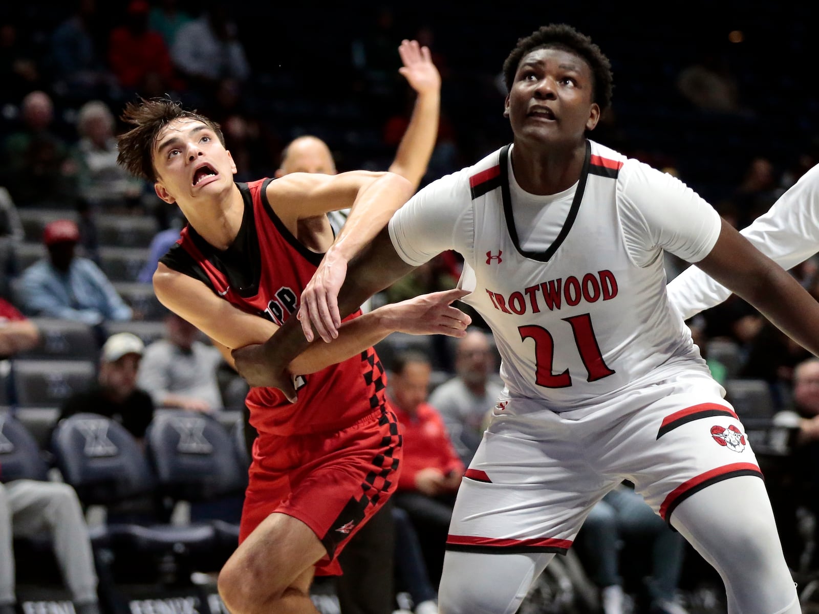 Trotwood sophomore Jameer Whyce keeps Tippecanoe senior Colin Turner from a potential rebound during a Division III regional semifinal game Tuesday, March 10, 2026, at the Cintas Center in Cincinnati. Trotwood won 46-44. STEVEN WRIGHT / STAFF