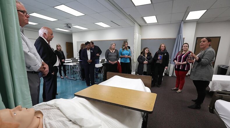 NEW CUTLINE: Clark State Community College’s Emergency Medical Services program is getting an ambulatory simulation rig, or SimRig, training tool. BILL LACKEY/STAFFINITIAL CUTLINE: Clark State Community College gave special guests and members of the community a tour of their new STNA lab Friday in the Applied Science Center of the Leffel Lane campus. Renovations to the lab began last December with funding provided in part by the Springfield Foundation. BILL LACKEY/STAFF