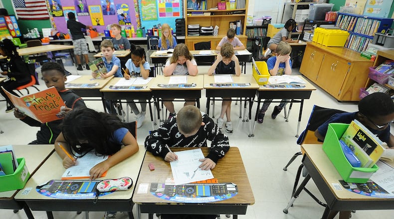Northwoods Elementary second grade class of teacher Mindy Ferguson working at their desk. MARSHALL GORBY\STAFF