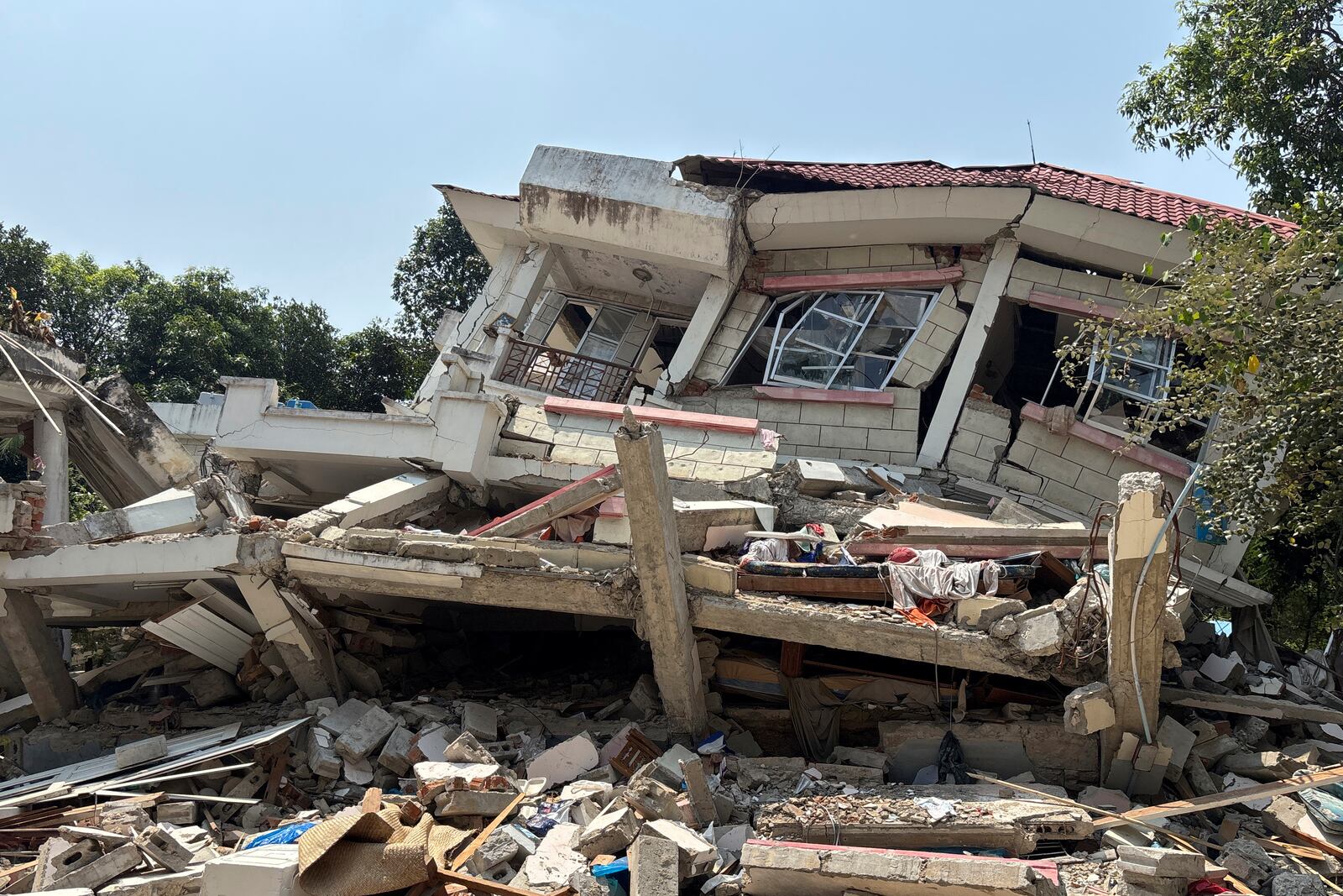 A damaged building is seen in Naypyitaw, Myanmar, Monday, April 28, 2025, one month after the earthquake. (AP Photo/Aung Shine Oo)
