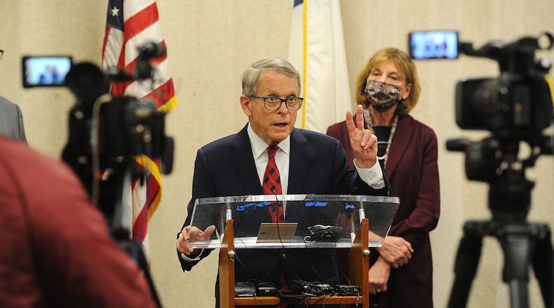 Ohio Gov. Mike DeWine is in Dayton March 8, 2021 visiting the Bethesda Temple vaccination site on Salem Avenue in Harrison Twp. MARSHALL GORBY\STAFF