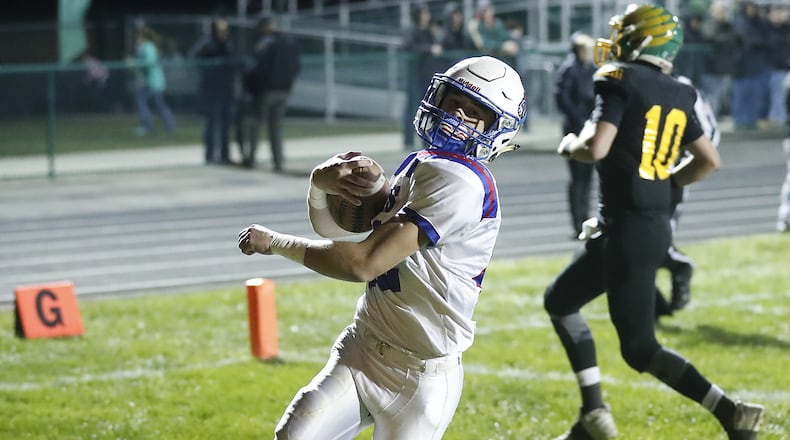 Greeneview’s Clay Payton runs in for a Rams’ touchdown in the first quarter of the game at Madison-Plains during the 2017 season. Bill Lackey/Staff
