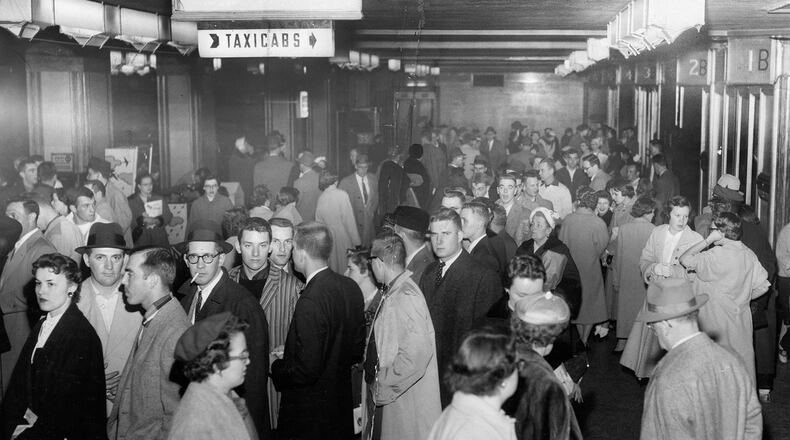Passengers head to the trains at Union Station in Dayton in 1956. DAYTON DAILY NEWS ARCHIVE