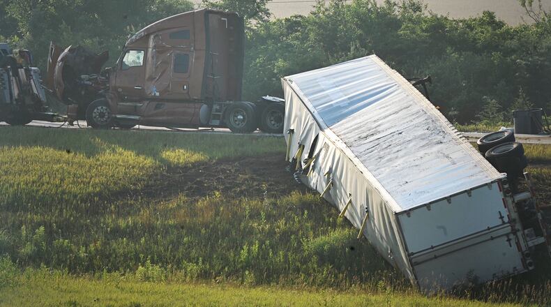 A semi rollover crash Wednesday morning closed the I-675 north ramp to I-70 east. STAFF PHOTO / MARSHALL GORBY