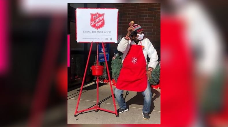 Steven Hunter, a Springfield Salvation Army bell ringer, dances outside of Kroger to encourage residents to donate this holiday season.