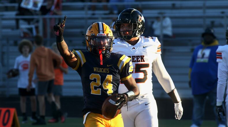 Springfield's Deontre Long celebrates a first-quarter touchdown run against Beavercreek on Friday, Sept. 15, 2023, in Springfield. David Jablonski/Staff