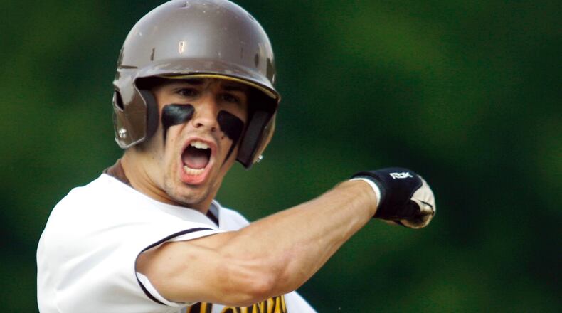 Adam Eaton (2) of Kenton Ridge High School celebrates hitting a triple during a Division II regional baseball semifinal game against Cincinnati Wyoming High School in 2007 at Carleton Davidson Stadium. Eaton would score the first run for Kenton Ridge on the next batter. Kenton Ridge won, 3-1. Staff Photo by Barbara J. Perenic