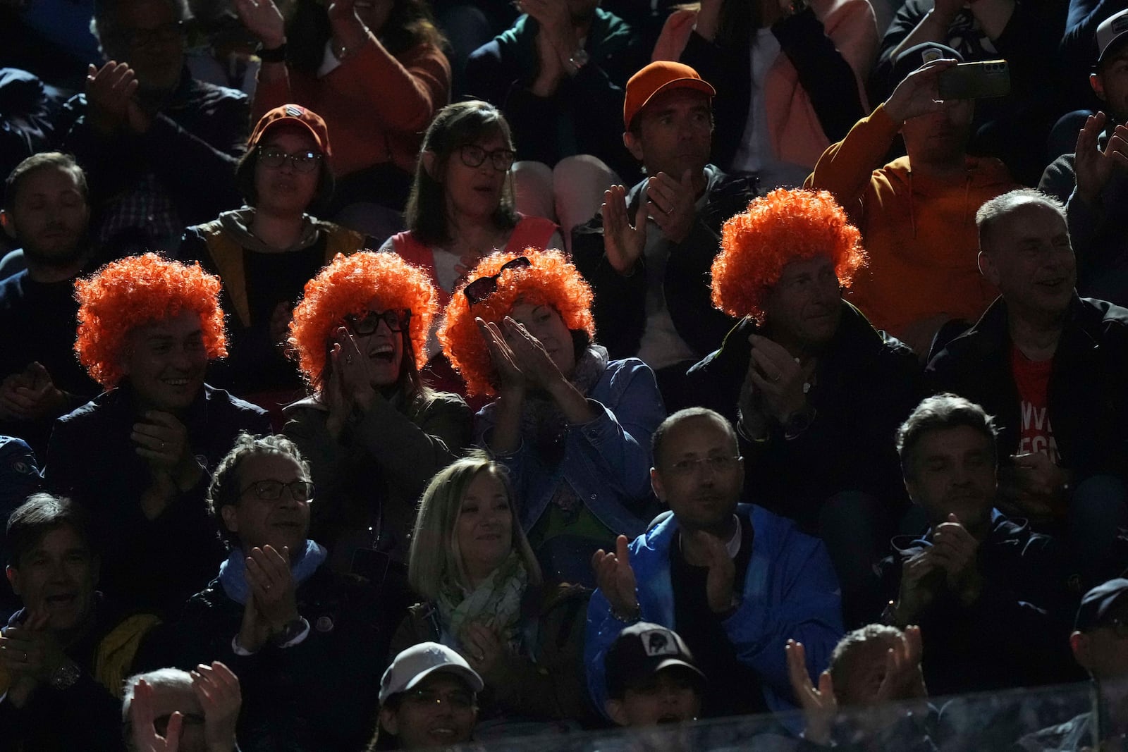 Jannik Sinner fans wait for the start of the semifinal tennis match against Tommy Paul, of the United States, at the Italian Open, in Rome, Friday, May 16, 2025. (AP Photo/Andrew Medichini)