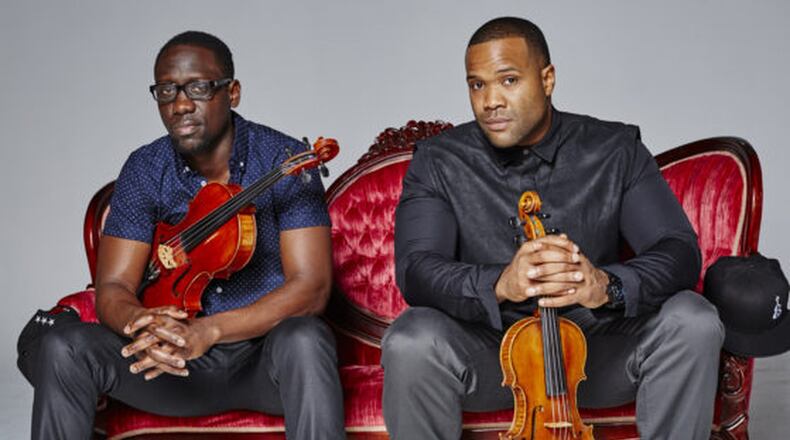 Black Violin, the duo of violist Wil B. (left) and violinist Kev Marcus fuses classical music with hip-hop when it returns to the Clark State Performing Arts Center for its Classical Boom Tour. CONTRIBUTED