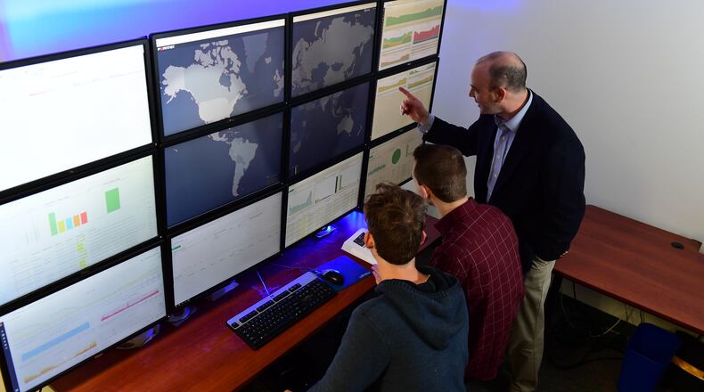 Seth Hamman and cyber security students. Contributed/Cedarville University