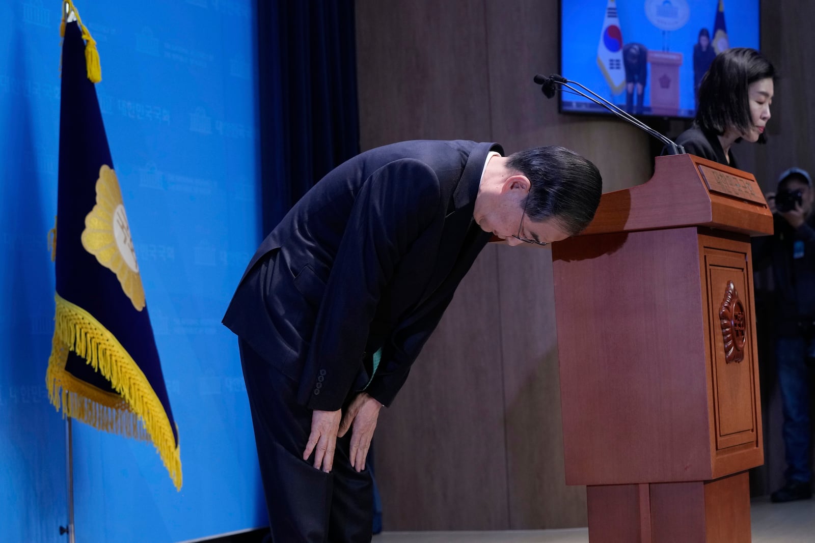 South Korean former Prime Minister Han Duck-soo bows after a press conference to announce a presidential bid at the National Assembly in Seoul, South Korea, Friday, May 2, 2025. (AP Photo/Ahn Young-joon)