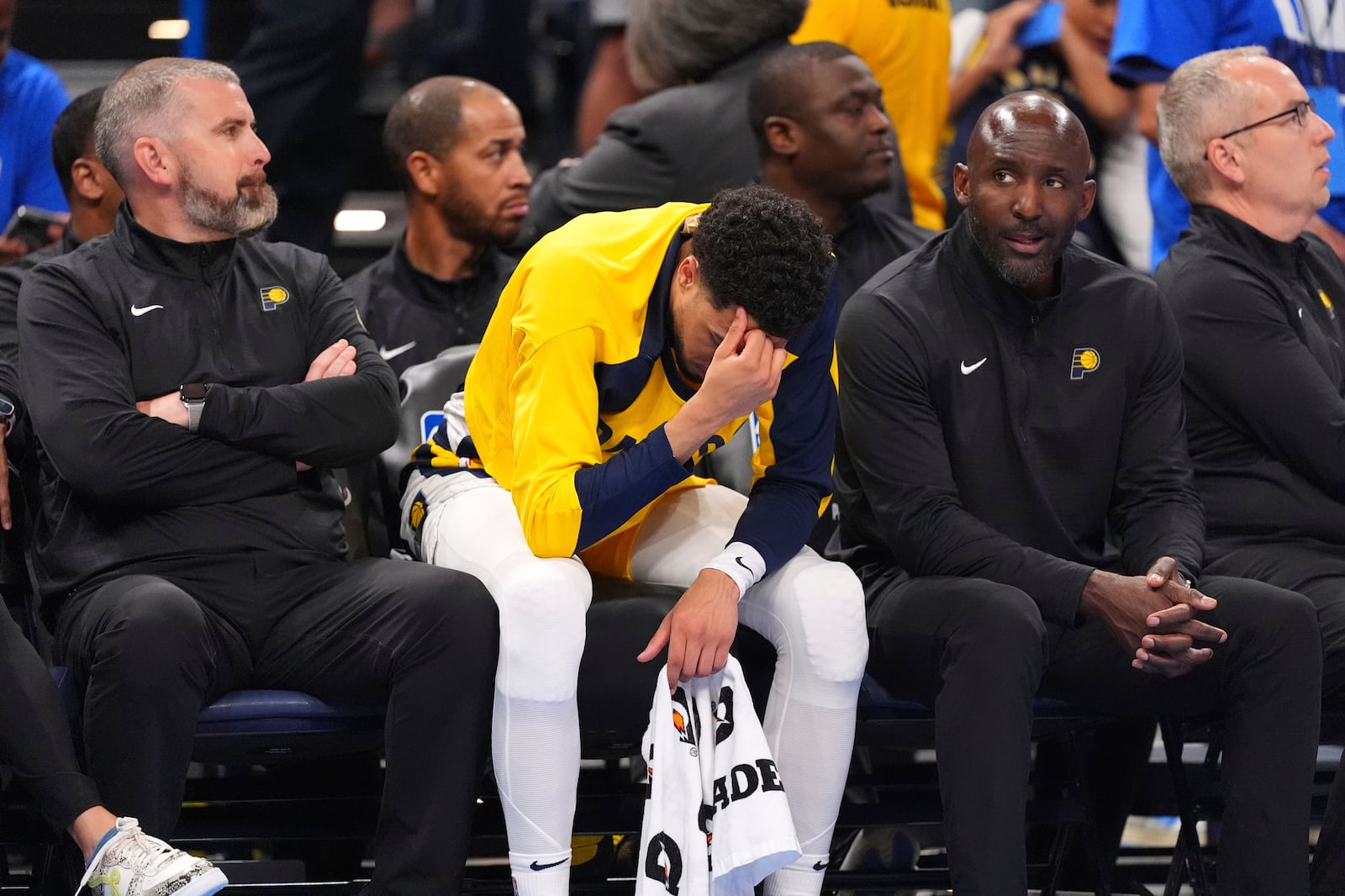 Indiana Pacers guard Tyrese Haliburton, center, reacts during the second half of Game 2 of the NBA Finals basketball series against the Oklahoma City Thunder Sunday, June 8, 2025, in Oklahoma City. (AP Photo/Julio Cortez)