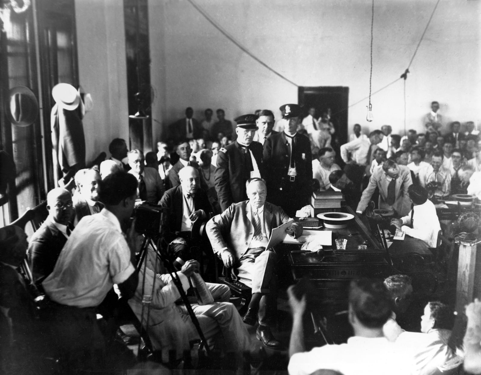 FILE - Judge John T. Raulston of Winchester, Tenn., holds the decision in the Tennessee vs. John Scopes case at the Rhea County Courthouse in Dayton, Tenn., on July 17, 1925. (AP Photo/File)