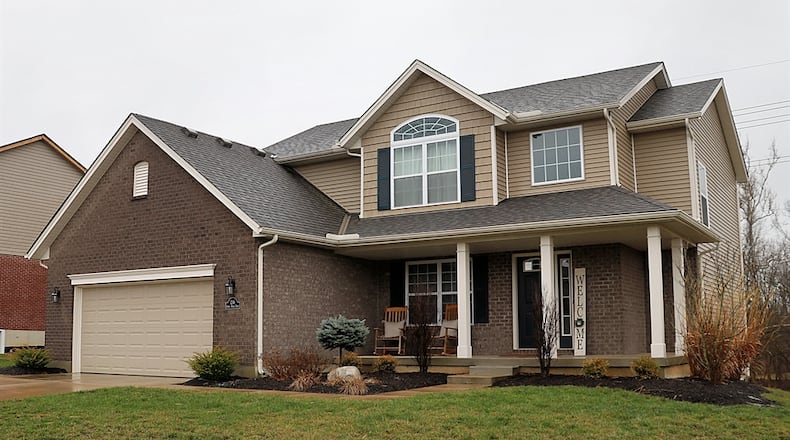 An open-concept floor plan highlights this four-bedroom, two-story home located within the Heincke Woods neighborhood of Miamisburg. CONTRIBUTED PHOTOS BY KATHY TYLER