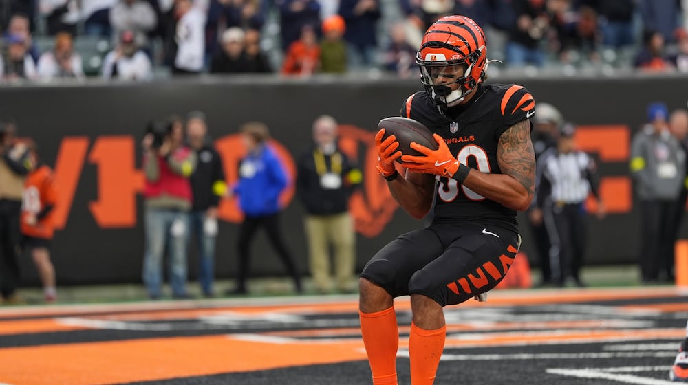 Cincinnati Bengals wide receiver Andrei Iosivas (80) scores a touchdown during the first half of an NFL football game against the Chicago Bears, Sunday, Nov. 2, 2025, in Cincinnati. (AP Photo/Joshua A. Bickel)