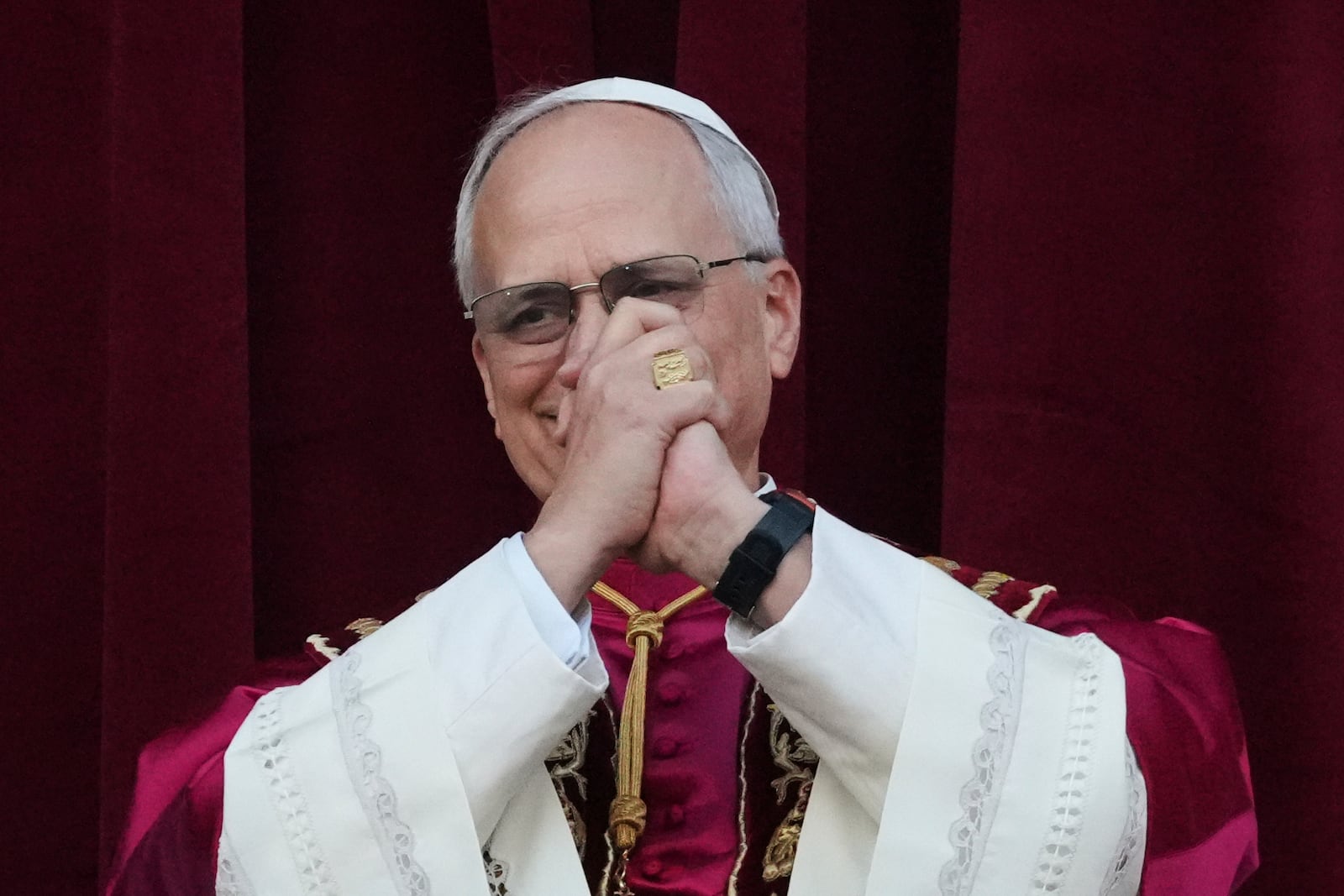 Newly elected Pope Leo XIV appears at the balcony of St. Peter's Basilica at the Vatican, Thursday, May 8, 2025. (AP Photo/Alessandra Tarantino)