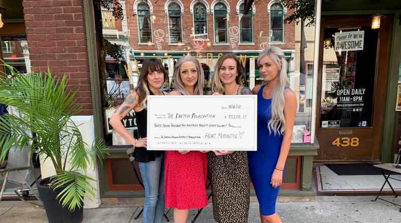 More than $37,000 was raised as part of a Heart Mercantile fundraiser for victims of the Aug. 4 shooting in the Oregon District. Pictured left to right: owners Kait Gilcher, Amanda Hensler, Carly Short and Brittany Smith.