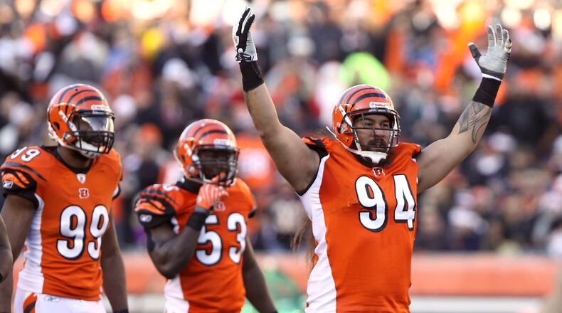 Cincinnati Bengals defensive tackle Domata Peko tries to rally the crows of 41,273 during an NFL football game against the Arizona Cardinals. Staff photo by Kareem Elgazzar