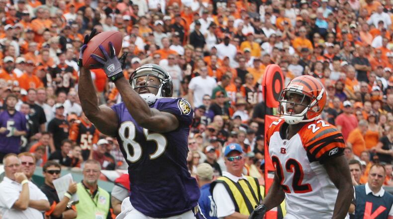 Derrick Mason, a Baltimore receiver, scores a touchdown against the Bengals in this September 2010 game. FILE