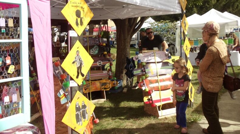 A vendor sells skateboards and related accessories at Cyclops Fest. After a year off the festival will return Saturday, Sept. 8 in Yellow Springs. CONTRIBUTED