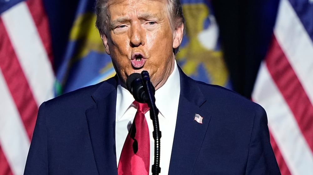 President Donald Trump speaks at the Detroit Economic Club, Tuesday, Jan. 13, 2026 in Detroit. (AP Photo/Ryan Sun)