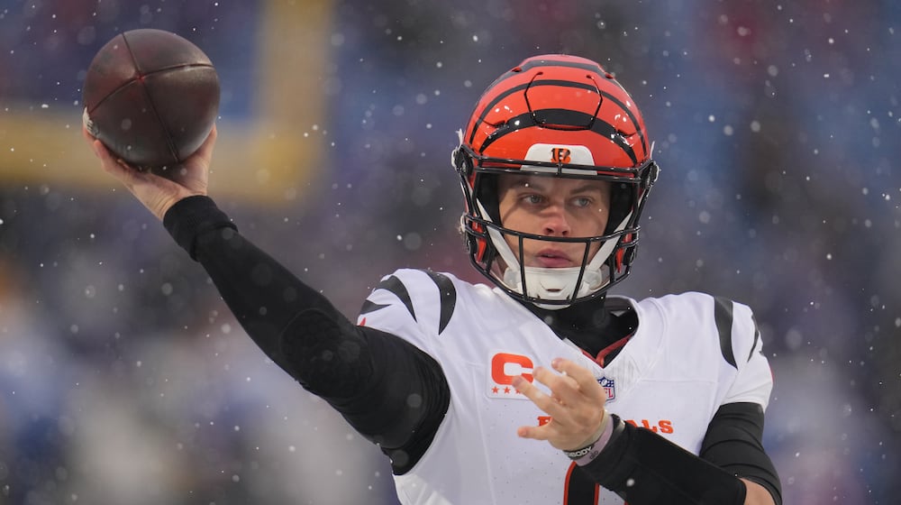 Cincinnati Bengals quarterback Joe Burrow throws a pass during warmups before an NFL football game against the Buffalo Bills, Sunday, Dec. 7, 2025, in Orchard Park, N.Y. (AP Photo/Gene J. Puskar)