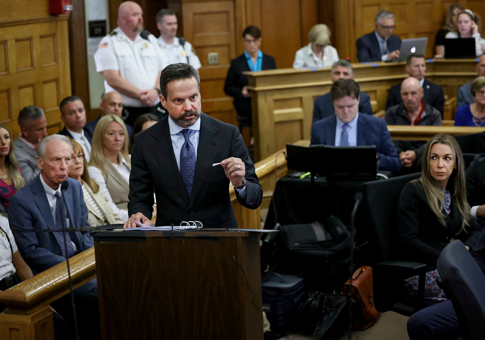Defense attorney Alan Jackson speaks to jurors during closing arguments in the murder trial of Karen Read, at right, in Norfolk Superior Court, Friday, June 13, 2025, in Dedham, Mass. (Mark Stockwell/The Sun Chronicle via AP, Pool) /// [EXTERNAL]