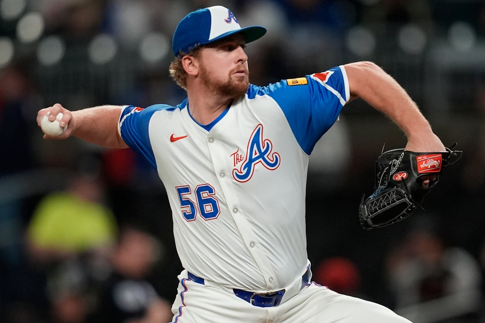 Atlanta Braves pitcher Spencer Schwellenbach (56) delivers against the Los Angeles Dodgers in the first inning of a baseball game, Saturday, May 3, 2025, in Atlanta. (AP Photo/Mike Stewart)