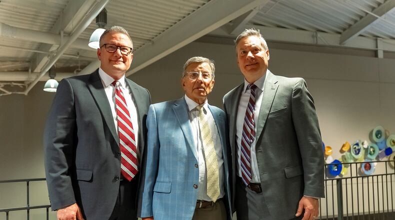 The Greater Springfield Partnership held its annual meeting and expo last week where Ed Leventhal (middle) was honored with the Richard L. Kuss Lifetime Community Achievement Award. Contributed