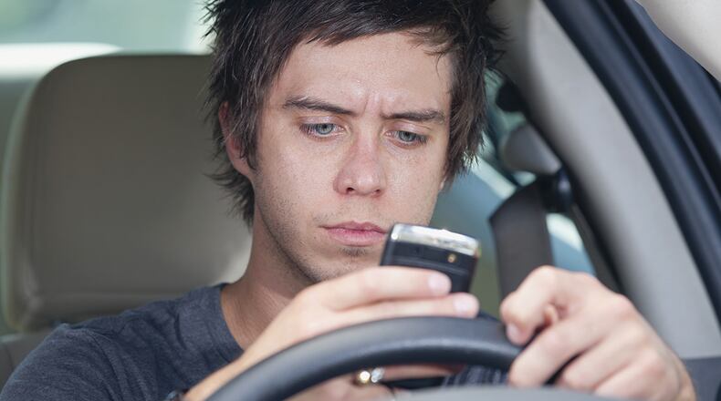 Texting while driving is one of the most dangerous forms of distracted driving. Metro News Service photo