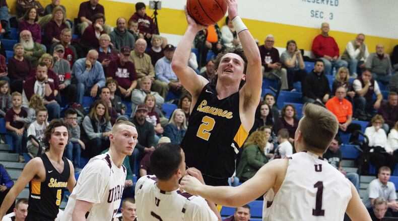 Shawnee senior guard Aaron Schack shoots over Urbana defenders during Wednesday night’s Division II second-round sectional game at Springfield High School. Jeff Gilbert/CONTRIBUTED