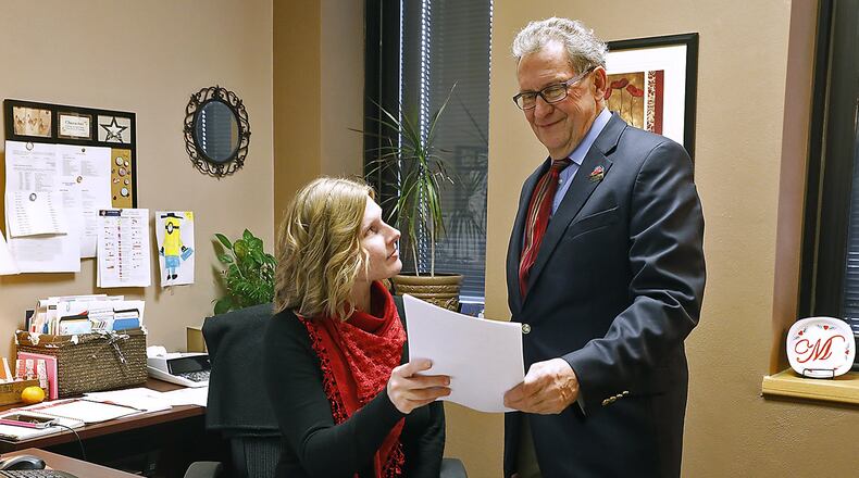 Clark County Commissioner John Detrick talks with Megan Lokai in the Commission Offices on Tuesday. Bill Lackey/Staff