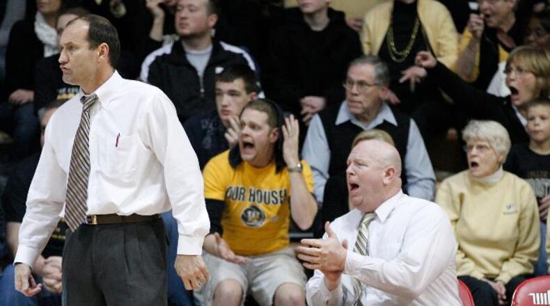 Wooster coaches and fans react to a call as the Scots took Witteberg to overtime during Saturday's basketball game at the Pam Evans Smith Arena in Springfield on, Feb. 11, 2012. Wittenberg won the game 68-62 in overtime.
Staff Photo by Barbara J. Perenic