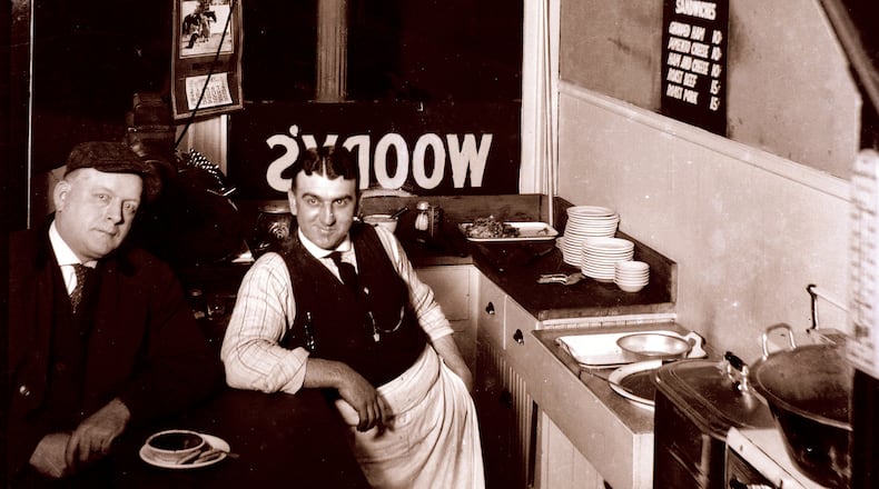 Claude Carl Woody Woodward was born in Shelby County, Ohio in 1890. Around 1900, his family came to Dayton where he worked for a time on the railway. Around 1920 he came to Springfield with his wife Bessie and son Robert and opened Woody s, a lunch counter at 12 N. Fountain, shown here in January 1921. By 1930, he has moved back to Dayton where the family ran a restaurant for a number of years on West 5th Street. CONTRIBUTED