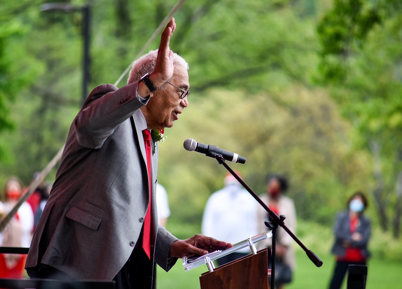 Wayne Embry speaks to a crowd during a ceremony and presentation of the Freedom Summer of '64 Award and unveiling of a statue in his honor Tuesday, May 18, 2021 at Miami University in Oxford. Wayne Embry and his late wife Theresa Embry, both Miami alumni, were awarded the Freedom of Summer of '64 Award for their life's work as civil right champions and mentors. A statue of Wayne Embry in a basketball pose, created by sculptor Tom Tsuchiya, was unveiled in front of Millett Hall and a scholarship in his name was announced to support Miami varsity men's basketball student athletes. NICK GRAHAM / STAFF