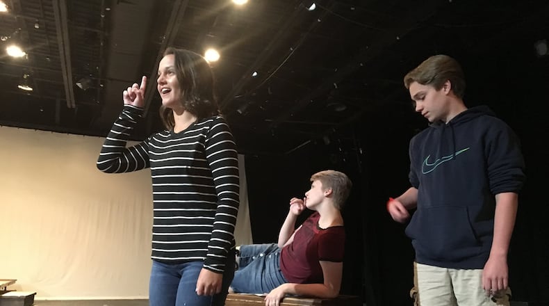 Ava Sullivan takes on her third different role in “Annie, Jr.” as Miss Hannigan, along with Youth Arts Ambassadors Maddie Straight and William Deever. CONTRIBUTED