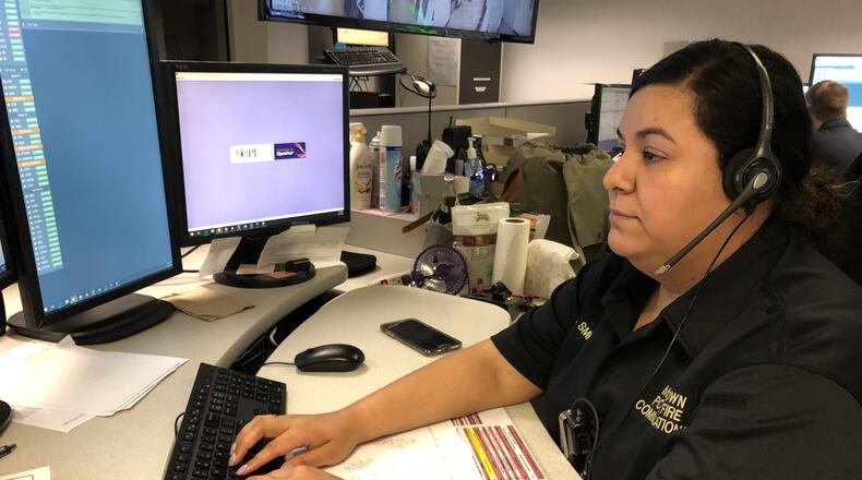 NallelytCQ Smith, who has been a police dispatcher for nearly five years, recently was named the City of Middletown’s Employee of the Year. RICK McCRABB/STAFF