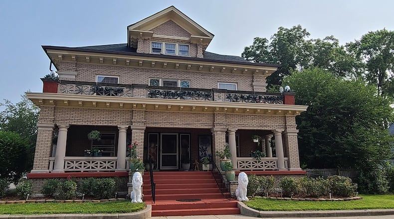The century-old, brick home has about 9,150 sq. ft. of living on 4 levels with 10 bedrooms and a covered front porch. A second porch is on the second level, and there is a detached, 2-car garage. CONTRIBUTED PHOTO