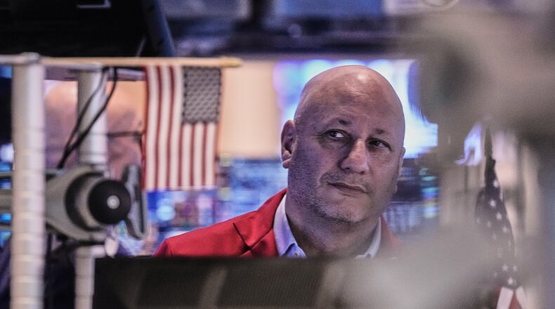 Trader John Mauro works on the floor of the New York Stock Exchange, Thursday, Jan. 8, 2026. (AP Photo/Richard Drew)