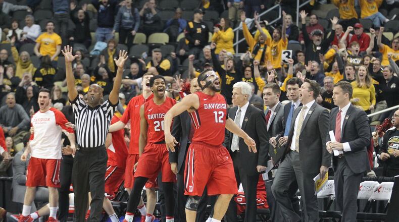 Davidson's Jack Gibbs celebrates after a 3-pointer in the final minute against Dayton on Friday, March 10, 2017.