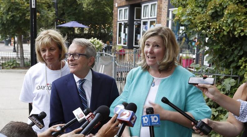 Gov. Mike DeWine, Dayton Mayor Nan Whaley talk to the media in this file photo.