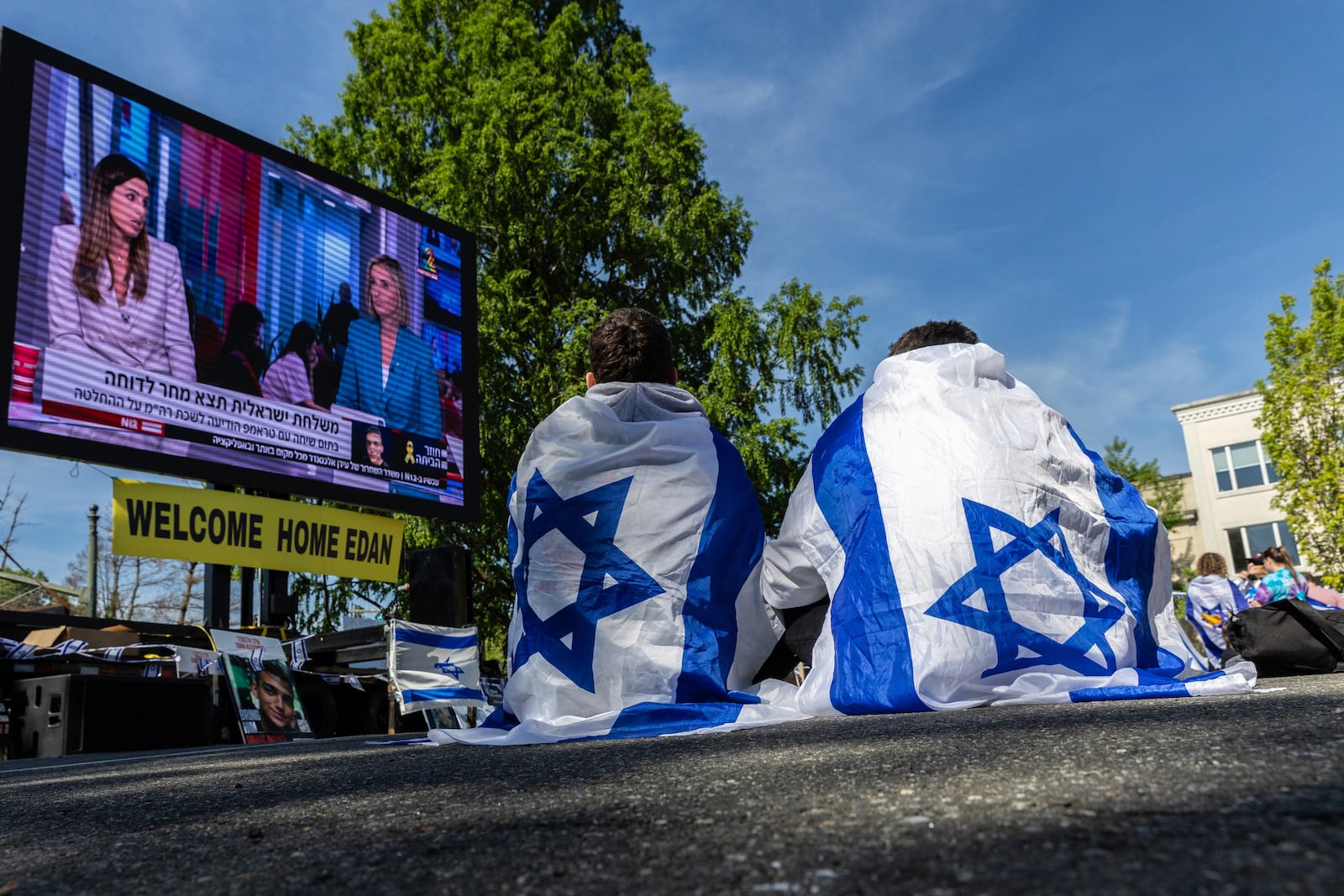 Residents and friends gather in Huyler Park ahead of the release of American hostage Edan Alexander from Hamas on Monday, May 12, 2025 in Tenafly, N.J. (AP Photo/Stefan Jeremiah)