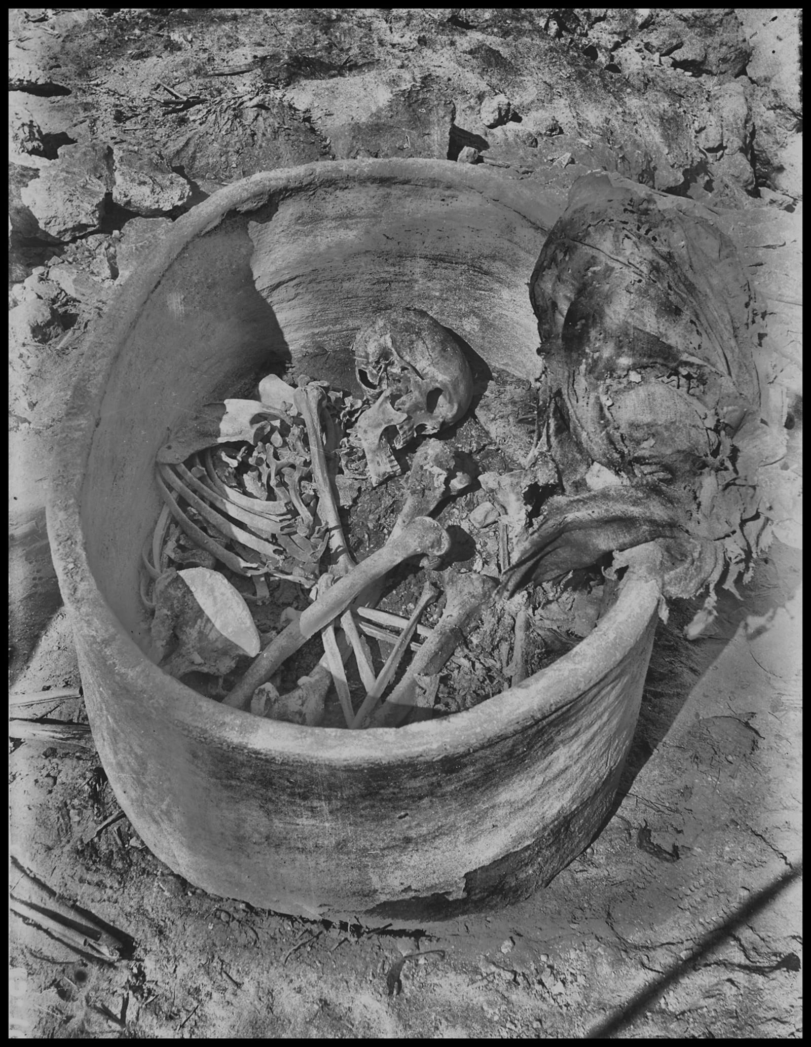 This photo provided by researchers shows a pottery vessel containing the remains of a man, radiocarbon dated to around 2855–2570 cal BCE, in Nuwayrat, Egypt. (Mahmoud Abd El Gelel/Garstang Museum of Archaeology/University of Liverpool via AP)