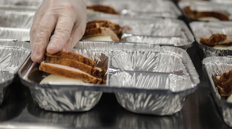 Daybreak, in partnership with Miami Valley Meals, works on 4000 Thanksgiving meals which will be distributed on Wednesday Nov. 25, 2020, at the University of Dayton and Trotwood Madison High School from 9am to 12pm.