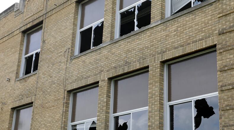 Clark County has received a $268,000 state grant that will be used to demolish Madison Street elementary school - a project New Carlisle has been trying to fund for nearly 10 years. BILL LACKEY/STAFF